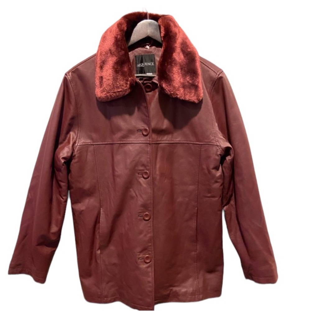 Nw/oT. Ladies Burgundy leather jacket. Size 12 Removable fuzzy collar